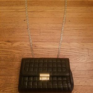 Jean Jacket, Black Purse , Tan Purse 15 dollars each. practically new